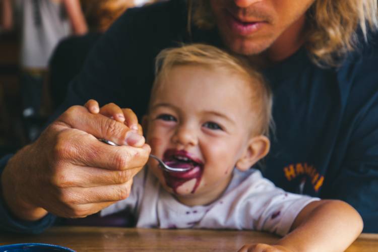 kid eating at restaurant